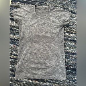 Lululemon slate/white athletic top. Womens size 10.